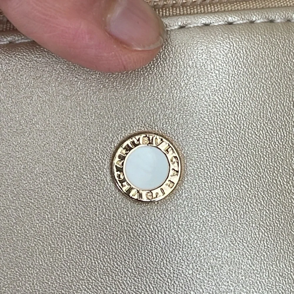 Bvlgari metallic gold faux leather cosmetics bag